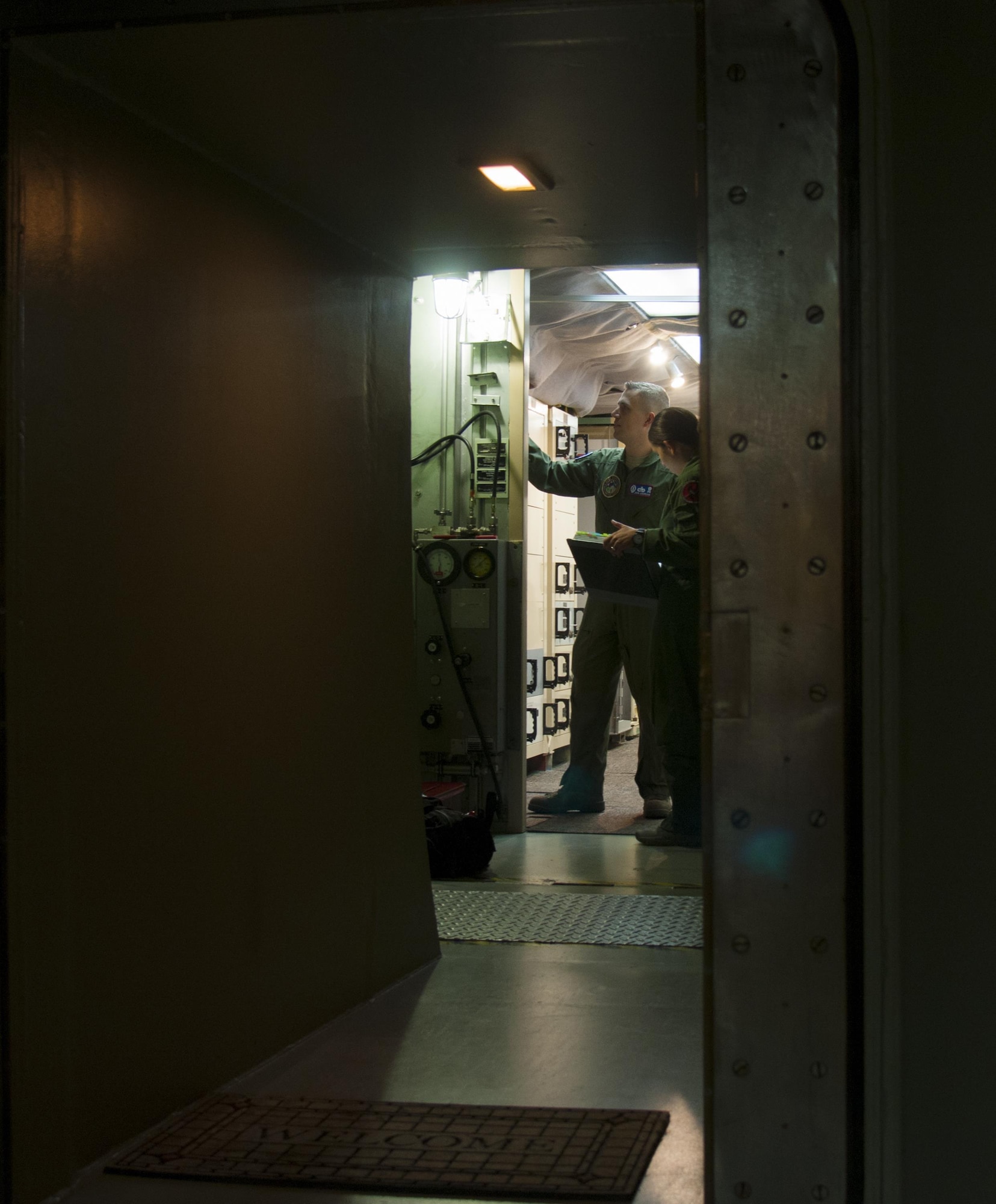 1st Lt. Pamela Blanco-Coca, 319th Missile Squadron missile combat crew commander, and 2nd Lt. John Anderson, 319th MS deputy missile combat crew commander, conduct pre-operational checks at a launch control center in the F.E. Warren Air Force Base, Wyo., missile complex Feb. 9, 2016. The missileers worked heavily in conjunction with missile maintainers to conduct a test of Minuteman III weapon system components in a test known as the Simulated Electronic Launch-Minuteman. (U.S. Air Force photo by Senior Airman Jason Wiese)