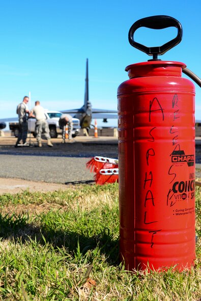 An asphalt sprayer is used by the 2nd Civil Engineer Squadron Dirtboys on Barksdale Air Force Base, La., Feb. 11, 2016. When a tool is selected for use in a project, it is coated with spray to prevent fresh asphalt, tar and adhesives from sticking. (U.S. Air Force photo/Senior Airman Benjamin Raughton)