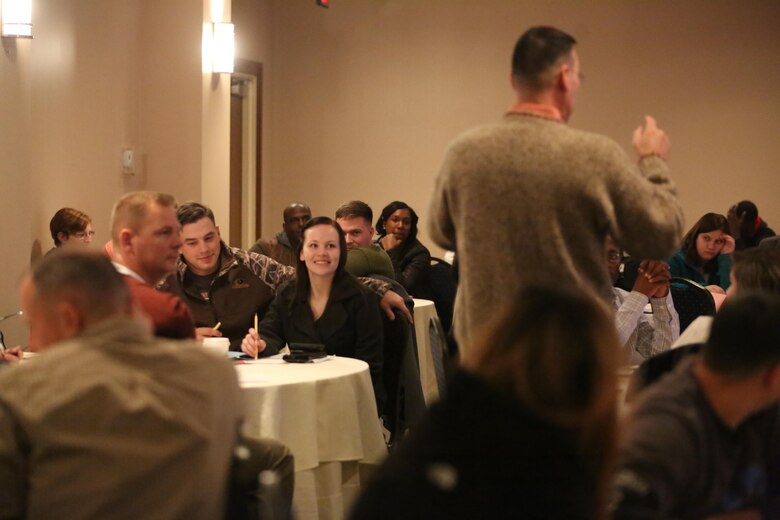 A chaplain instructs couples during the semi-annual Chaplain’s Religious Enrichment Development Operation Marriage Enrichment Retreat in New Bern, Feb. 5-6. More than 30 couples attended the retreat and participated in various relationship strengthening activities including: Hidden Keys to a Loving Relationship, The Love Bank, Love Busters and Love Builders. (U.S. Marine Corps Photo by Sgt. Grace L. Waladkewics/Released)