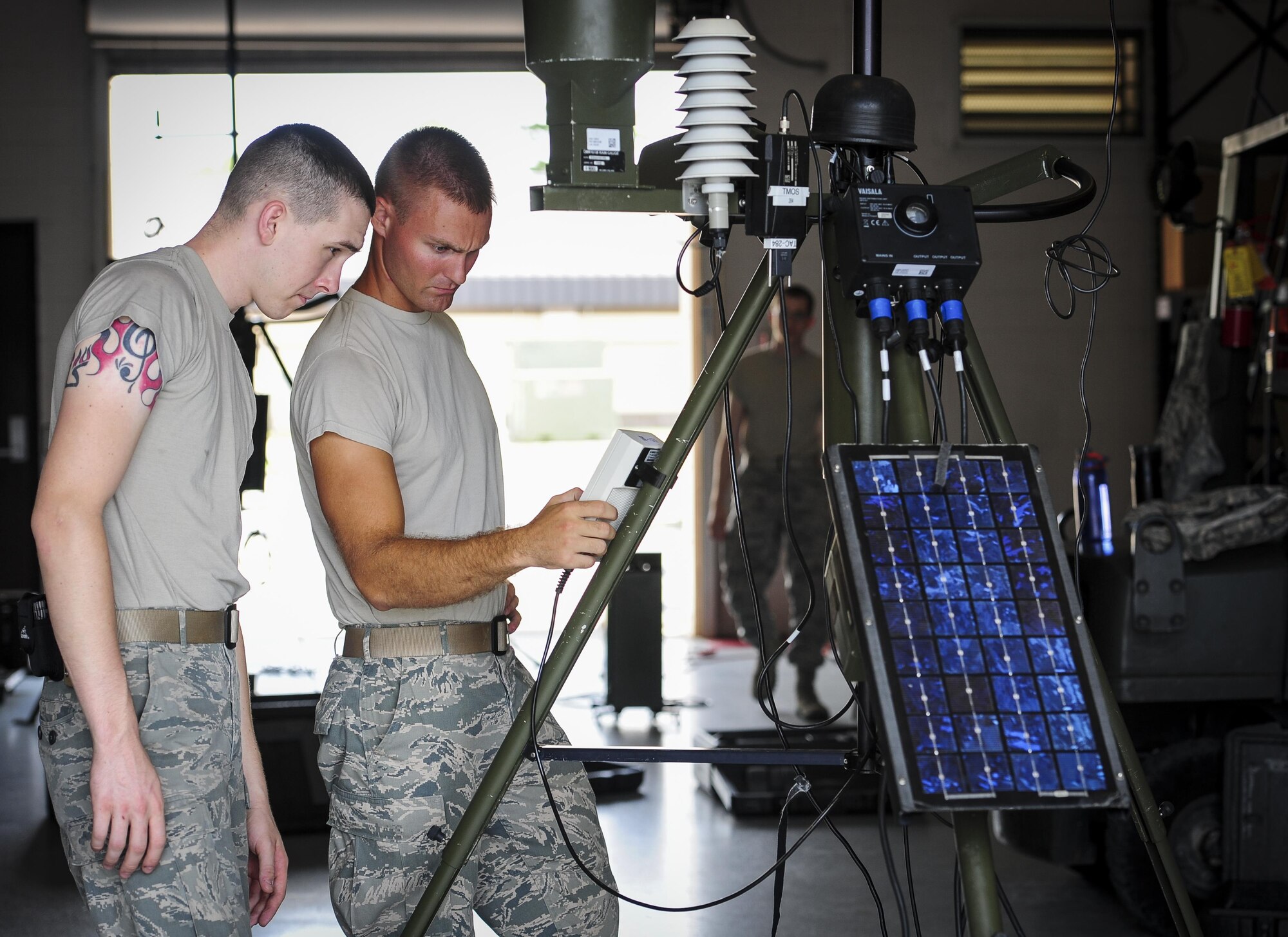 Tech. Sgt. Michael Nelson, NCO in charge of mission weather from Spangdahelm Air Base, Germany, observes a Portable Doppler Radar at Hurlburt Field, Fla., July 21, 2015. Nelson is training with the 2nd Combat Weather Systems Squadron for an upcoming deployment. 2 CWSS is the Air Force’s primary facility to test and evaluate new and existing tactical and fixed weather systems, train Airmen on tactical systems prior to deployment and provide manpower for the Weather Systems Support Cadre. (U.S. Air Force photo by Senior Airman Meagan Schutter)