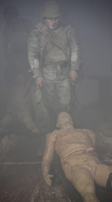U.S. Navy Seaman Edson Gonzales, a hospitalman with 2nd Medical Battalion, drags a casualty during a tactical combat casualty care exercise at Camp Lejeune, N.C., Feb. 12, 2016. Sailors were intentionally exhausted prior to beginning the simulation. (U.S. Marine Corps photo by Cpl. Paul S. Martinez/Released)