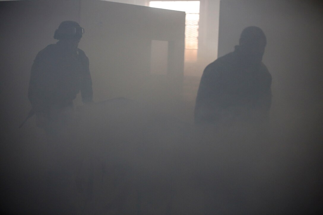 U.S. Navy Sailors with 2nd Medical Battalion, evacuate a casualty during a tactical combat casualty care exercise at Camp Lejeune, N.C., Feb. 12, 2016. The extent of the injuries sailors had to treat on their patients included penetrating chest trauma, shrapnel penetration, amputation, airway obstructions and facial trauma. (U.S. Marine Corps photo by Cpl. Paul S. Martinez/Released)