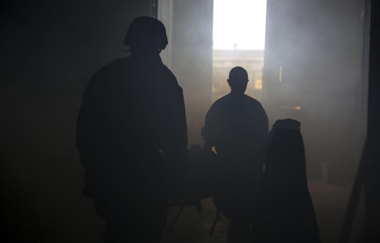 U.S. Navy Sailors with 2nd Medical Battalion, evacuate a casualty during a tactical combat casualty care exercise at Camp Lejeune, N.C., Feb. 12, 2016. The extent of the injuries sailors had to treat on their patients included penetrating chest trauma, shrapnel penetration, amputation, airway obstructions and facial trauma. (U.S. Marine Corps photo by Cpl. Paul S. Martinez/Released)