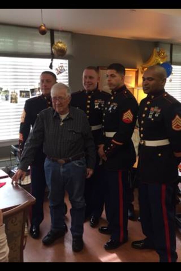 Marines of Battery Q, 5th Battalion, 14th Marine Regiment, 4th Marine Division, attended the 89th birthday celebration of Robert Moody, a World War II Marine veteran of the Pacific campaign, Dec. 19, 2015, at an assisted living center in the Denver area. Moody passed away 12 days later of lung cancer and received military funeral honors at Fort Logan National Cemetery. (Courtesy Photo)