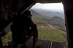 Sgt. Eric M. Ekelund prepares an MV-22B Osprey to land the tactical recovery of aircraft and personal force during a Cobra Gold 16 demonstration at Utapao, Thailand February 15. During the scenario-based training the MV-22B Osprey unloads the TRAP force personnel so they can continue on foot to rescue the simulated casualty. Cobra Gold is a multi-national exercise that focuses on increasing relationships and capabilities of participating countries by training to form solutions to common challenges. Ekelund, from Bay Shore, New York is with Marine Medium Tiltrotor Squadron 262, Marine Aircraft Group 36, 1st Marine Aircraft Wing, III Marine Expeditionary Force. 