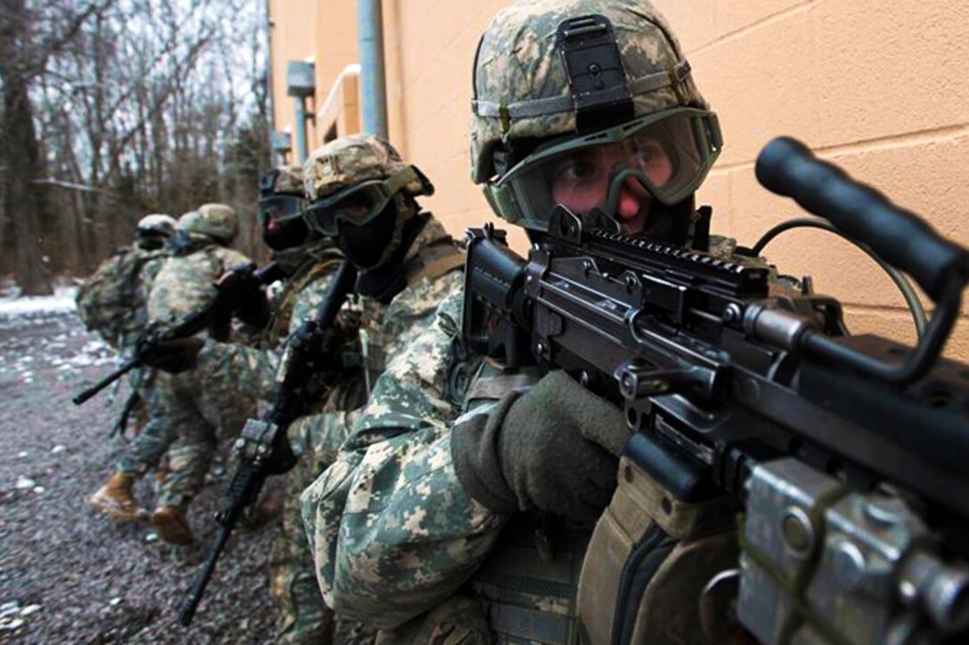 Soldiers secure an area during a live-fire exercise on Fort Campbell, Ky., Feb. 9, 2016. The soldiers are assigned to the 101st Airborne Division's 3rd Brigade Command Team. Army photo by Staff Sgt. Joel Salgado