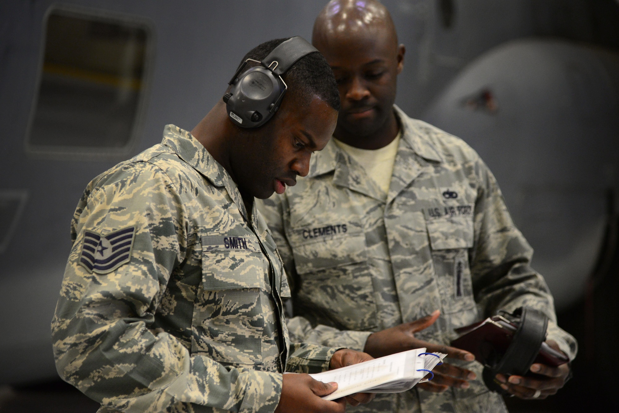 Tech. Sgt. Olin Smith, 27th Special Operations Maintenance Squadron AC-130W armament unit, conducts final checks pertaining to what was loaded during Cannon’s annual weapons load competition Feb. 5, 2016, at Cannon Air Force Base, N.M. Although the AC-130W team finished their objectives first, final results will not be announced until the Maintenance Professional of the Year banquet slated for later this month. (U.S. Air Force photo/Staff Sgt. Alexx Pons) 