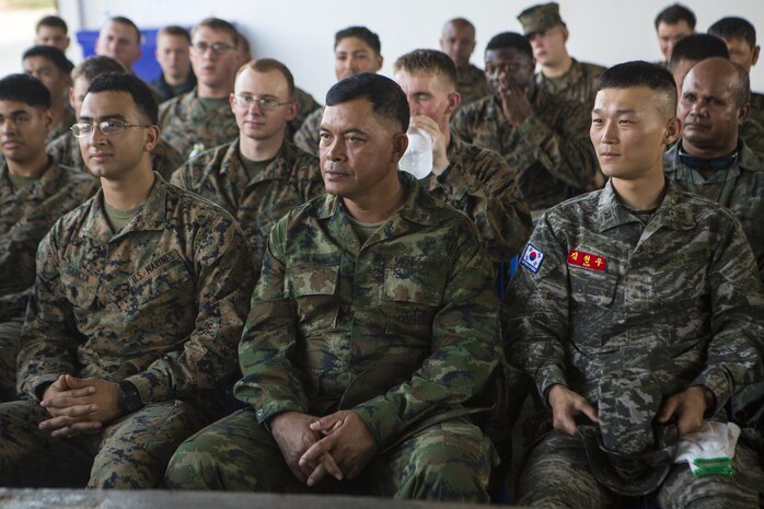 U.S., Thai, and Republic of Korea Marines pay attention to classes about the Korean Amphibious Assault Vehicle at the Thai AAV Camp in Chonburi, Thailand Feb. 14, 2016. CG16 provides a venue for both United States and all partner nations to increase partner capacity in planning and executing complex and realistic, combined task force operations. 