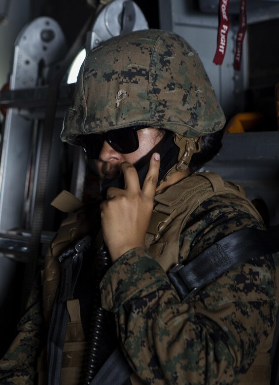 Pfc. Silvia Munozgarcia makes a radio call during the Cobra Gold 16 scenario-based training of the tactical recovery of aircraft and personnel at Utapao, Thailand February 15. Practicing TRAP missions allows the TRAP force to have the experience to respond quickly and accurately if an evacuation is needed. Cobra Gold is designed to advance interoperability, and increase capacity to plan and conduct combined task force to respond rapidly and effectively to regional crises. Munozgarcia, from San Francisco, California, is a radio operator with Marine Wing Support Squadron 172, Marine Aircraft Group 36, 1st Marine Aircraft Wing, III Marine Expeditionary Force.