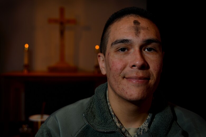 U.S. Air Force Capt. Edward Tabbutt, 609th Air Operations Center detachment 1 operations flight commander, stands in the Friendship Chapel after an Ash Wednesday service at Shaw Air Force Base, S.C., Feb. 10, 2016. Maintaining ones spiritual resiliency is an integral part of Comprehensive Airman Fitness. (U.S. Air Force photo by Senior Airman Michael Cossaboom)