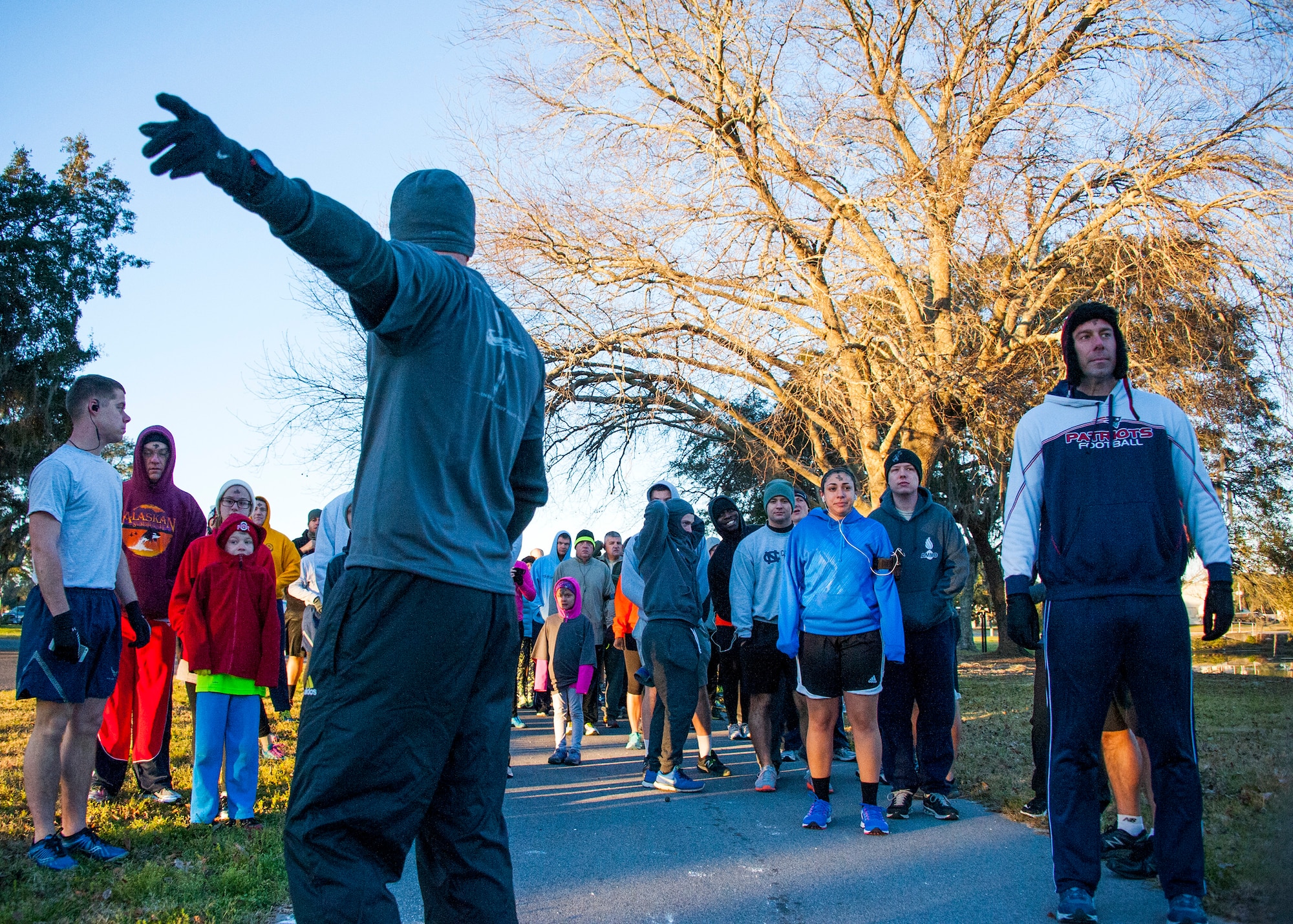 Capt. John Richardson, 96th Test Wing chaplain, points out the start of the runners’ course during the Ash Wednesday 5K Feb. 10 at Eglin Air Force Base, Fla. Approximately 115 runners and 15 volunteers endured a 29-degree temperature to participate in the run. Ash Wednesday marks the beginning of the Lent season for Christians. (U.S. Air Force photo/Ilka Cole)