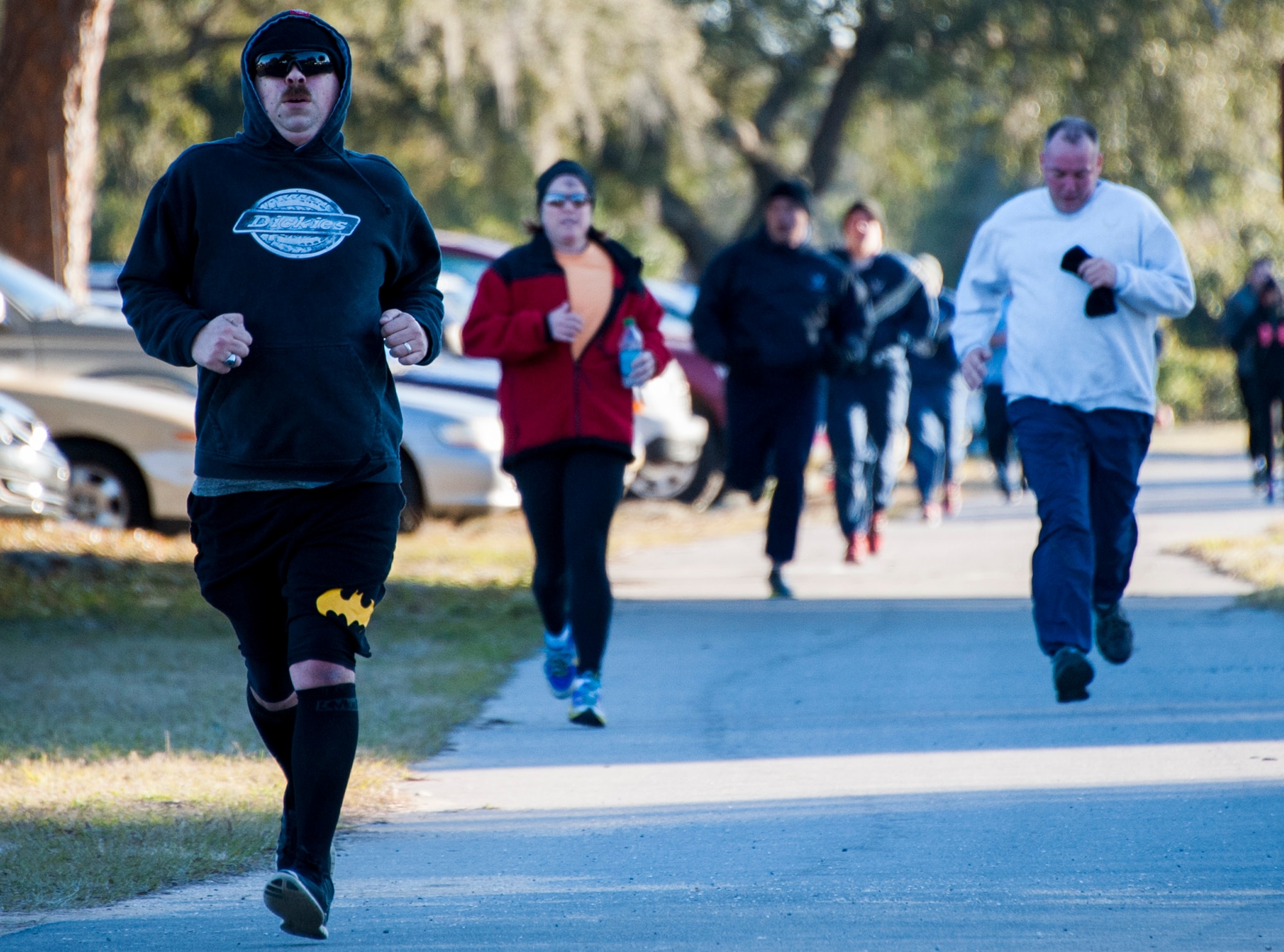 Runners move toward the finish line during the Ash Wednesday 5K Feb. 10 at Eglin Air Force Base, Fla. Approximately 115 runners and 15 volunteers endured a 29-degree temperature to participate in the run. Ash Wednesday marks the beginning of the Lent season for Christians. (U.S. Air Force photo/Ilka Cole)
