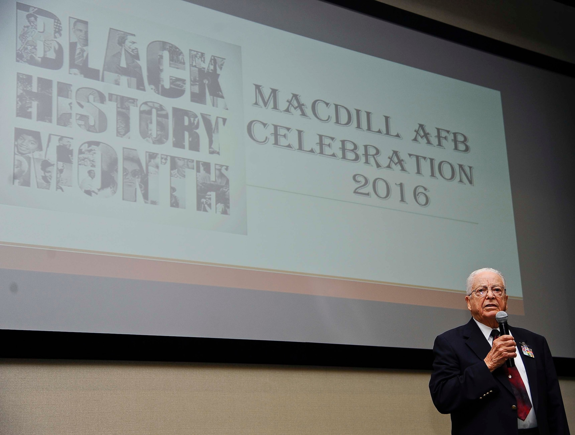 Retired Lt. Col. George E. Hardy, a Tuskegee Airman, gives a speech during the “A Salute To A Living Legend” event at MacDill Air Force Base, Fla., Feb. 11, 2016. In September of 1944, he was assigned to the famous 99th Fighter Squadron, 332nd Fighter Group at Ramitelli Air Base, Italy, where he would participate in 21 escort and strafing missions over Europe. (U.S. Air Force photo by Senior Airman Vernon L. Fowler Jr.)