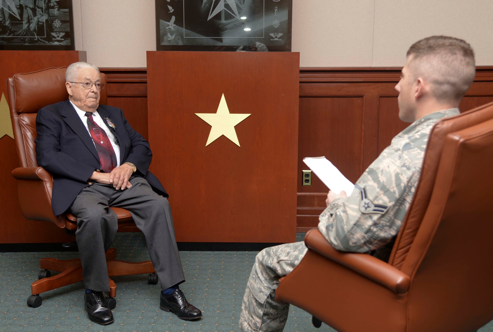 (Left) Retired Lt. Col. George E. Hardy, a Tuskegee Airman, is interviewed by Airman 1st Class Brad Tipton, a broadcaster assigned to the 6th Air Mobility Wing, prior to the “A Salute To A Living Legend” event at MacDill Air Force Base, Fla., Feb. 11, 2016. Hardy was invited to speak to an audience of more than 140 people at the Davis Conference Center. (U.S. Air Force photo by Senior Airman Vernon L. Fowler Jr.)
