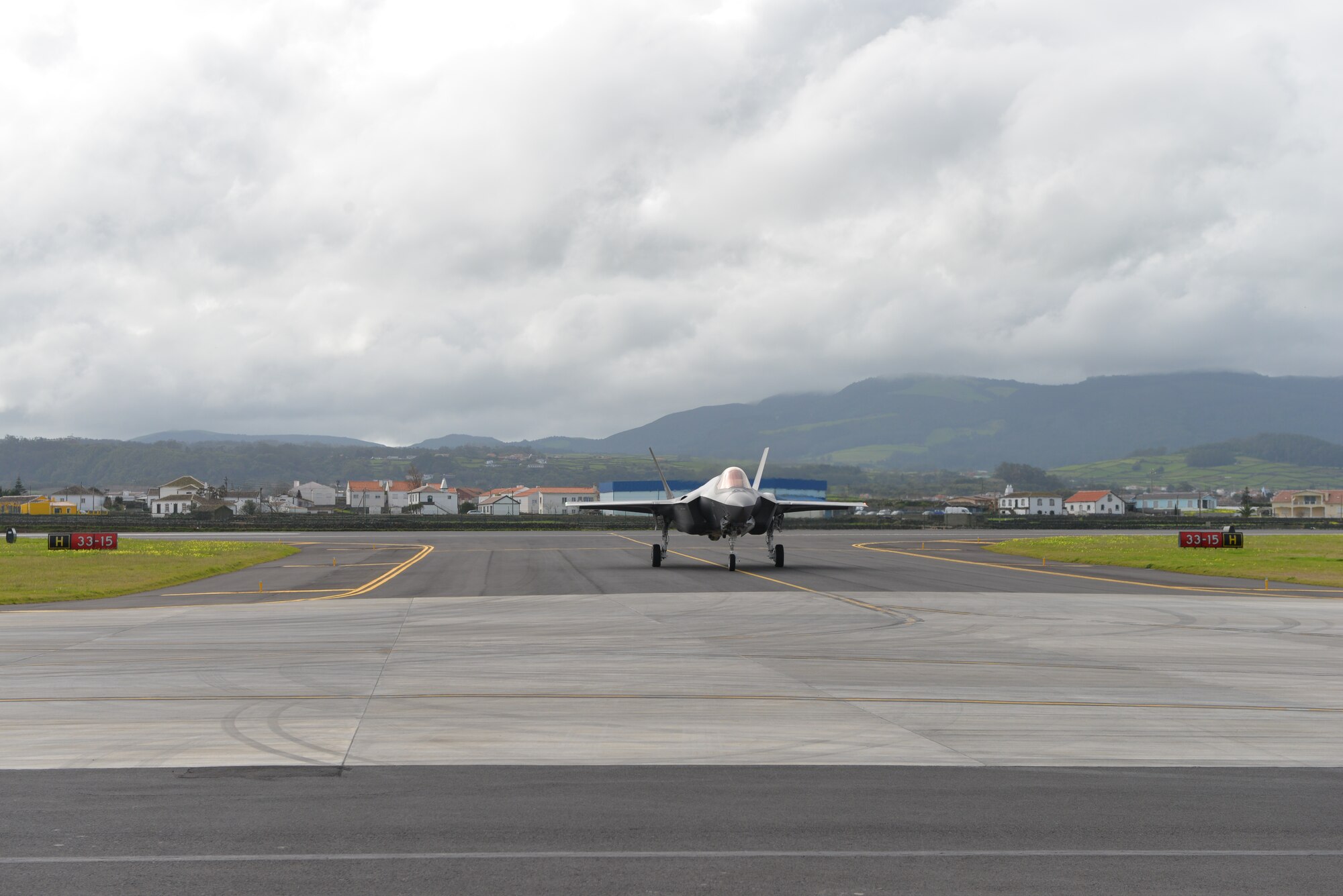 Air Force F-35A Lightning II lands at Lajes Field, Azores Portugal February 3, 2016. The Italian F-35A Lightning II refueled at Lajes Field on the first trans-Atlantic Ocean crossing from Cameri, Air Base Italy to Naval Air Station Patuxent River, Md., Feb 3-5. (U.S. Air Force photo by Ricky Baptista/Released) 