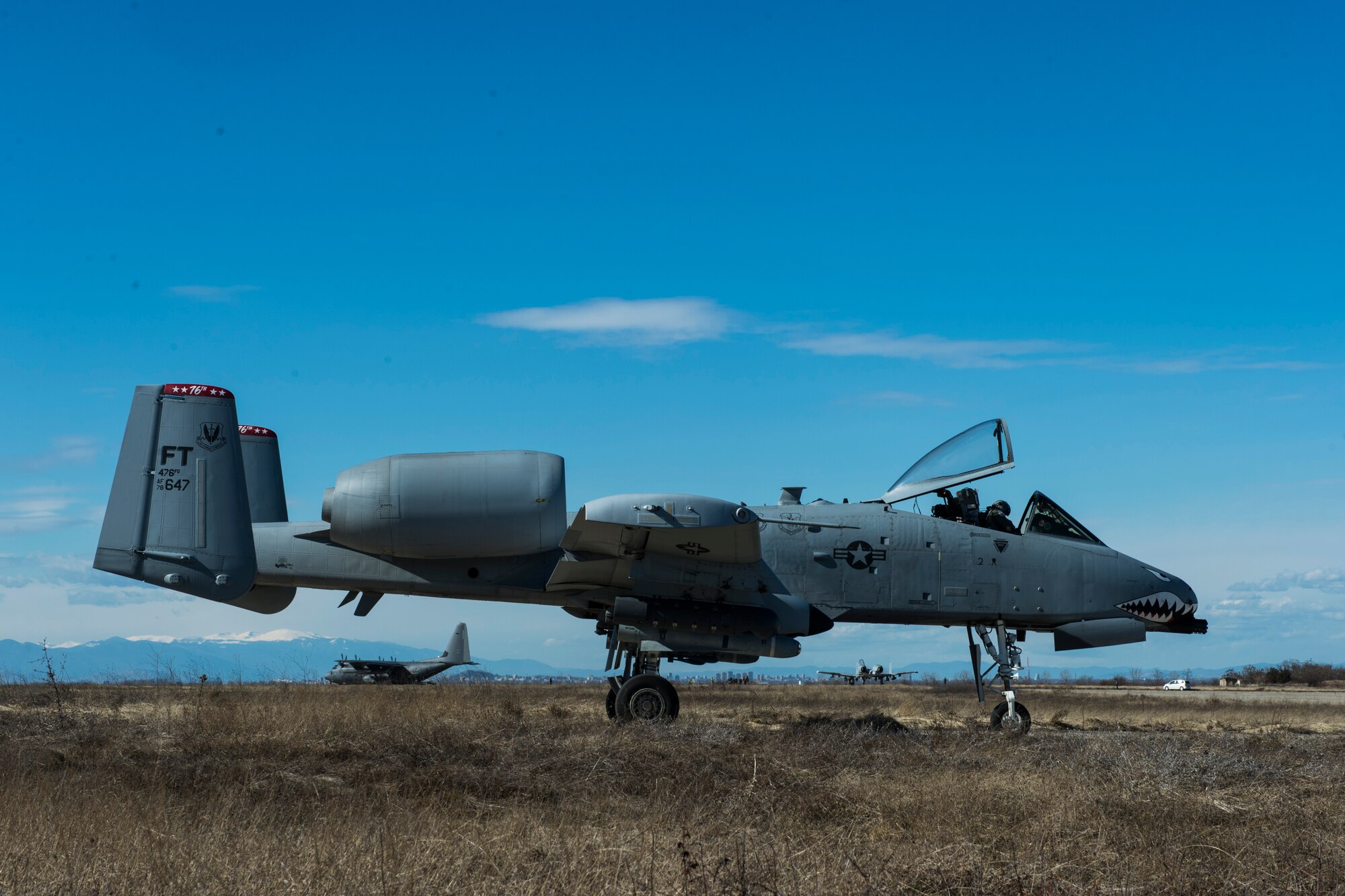 A 74th Expeditionary Fighter Squadron A-10C Thunderbolt II aircraft pilot waits to have his aircraft refueled during forward area refueling point training at Plovdiv, Bulgaria, Feb. 9, 2016. FARP capabilities allow one aircraft to refuel other aircraft in remote locations. (U.S. Air Force photo by Airman 1st Class Luke Kitterman/Released)