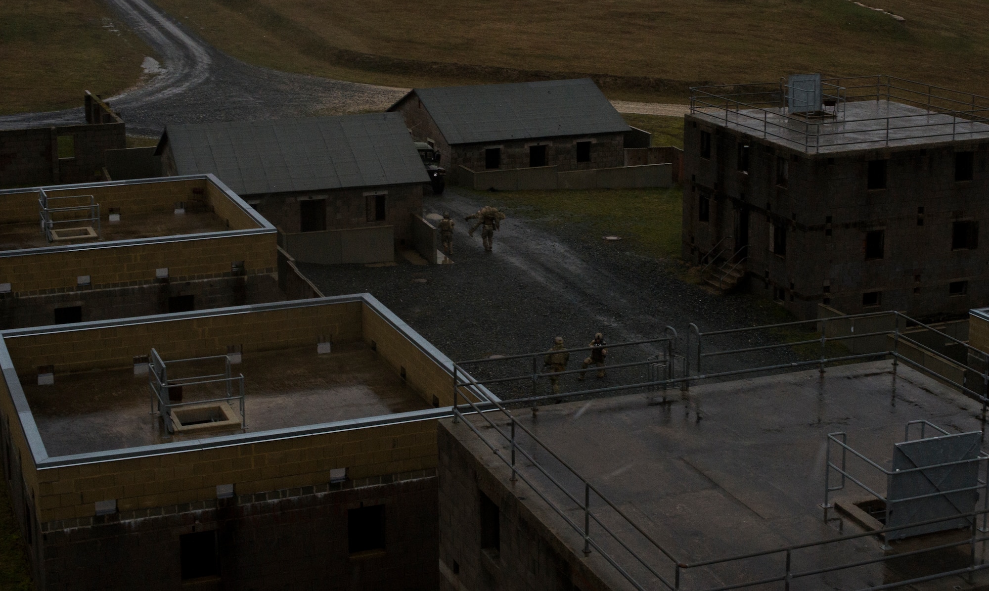 Airmen from the 2nd Air Support Operations Squadron carry a simulated casualty during training at U.S. Army Garrison Bavaria in Vilseck, Germany, Feb. 9, 2016. The training consisted of 2nd ASOS Airmen calling in close air support, neutralizing opposing forces and practicing medical evacuation by helicopter. Blank rounds and smoke grenades were used during the training to simulate the potential chaos ASOS Airmen may experience during a real world mission. (U.S. Air Force photo/Senior Airman Jonathan Stefanko)