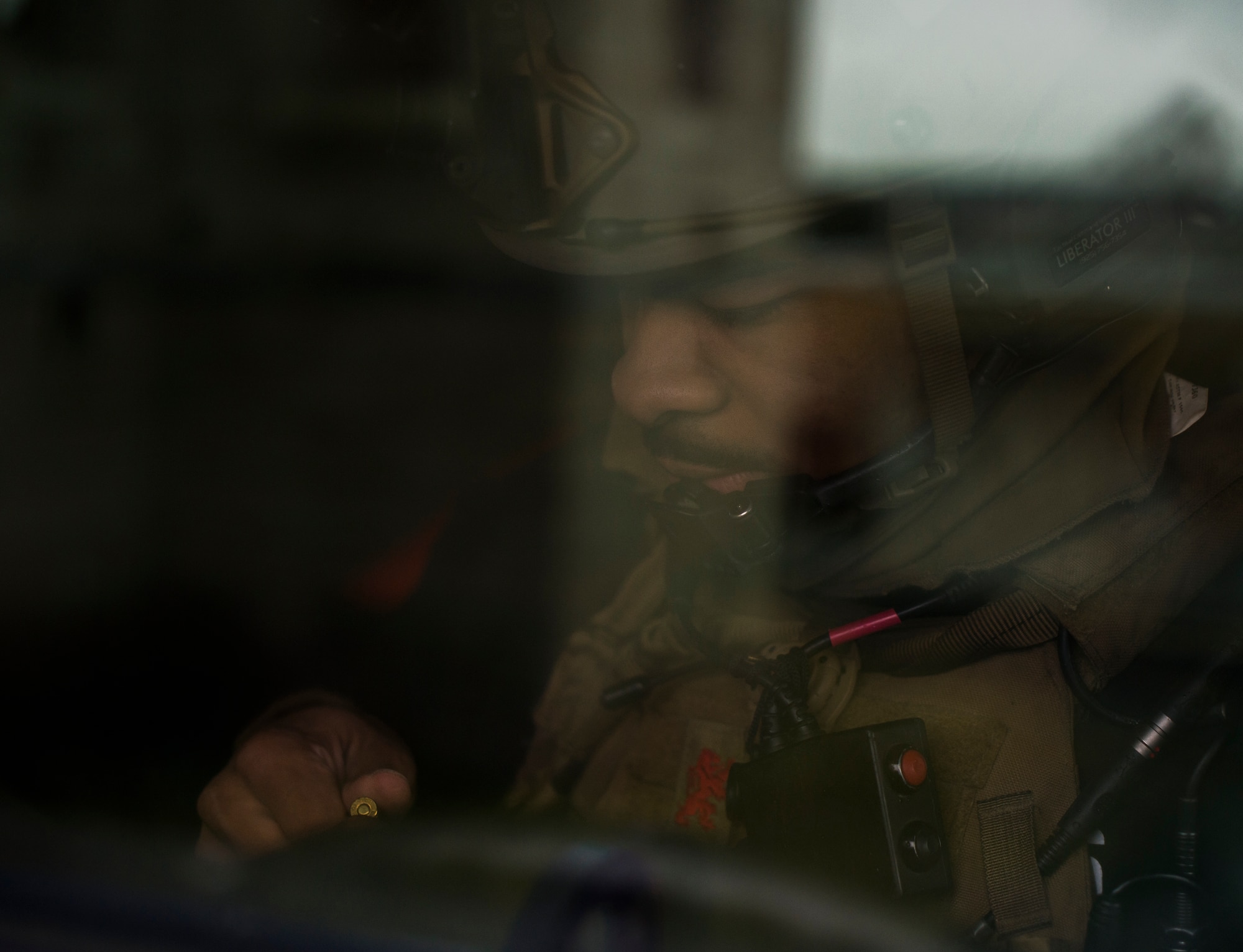 Senior Airman Deshaun Dixon, 2nd Air Support Operations Squadron, 2nd Air Support Operations Squadron joint terminal attack controller, loads his magazine with blank rounds during training at U.S. Army Garrison Bavaria in Vilseck, Germany, Feb. 9, 2016. The training consisted of 2nd ASOS Airmen calling in close air support, neutralizing opposing forces and practicing medical evacuation by helicopter. (U.S. Air Force photo/Senior Airman Jonathan Stefanko)