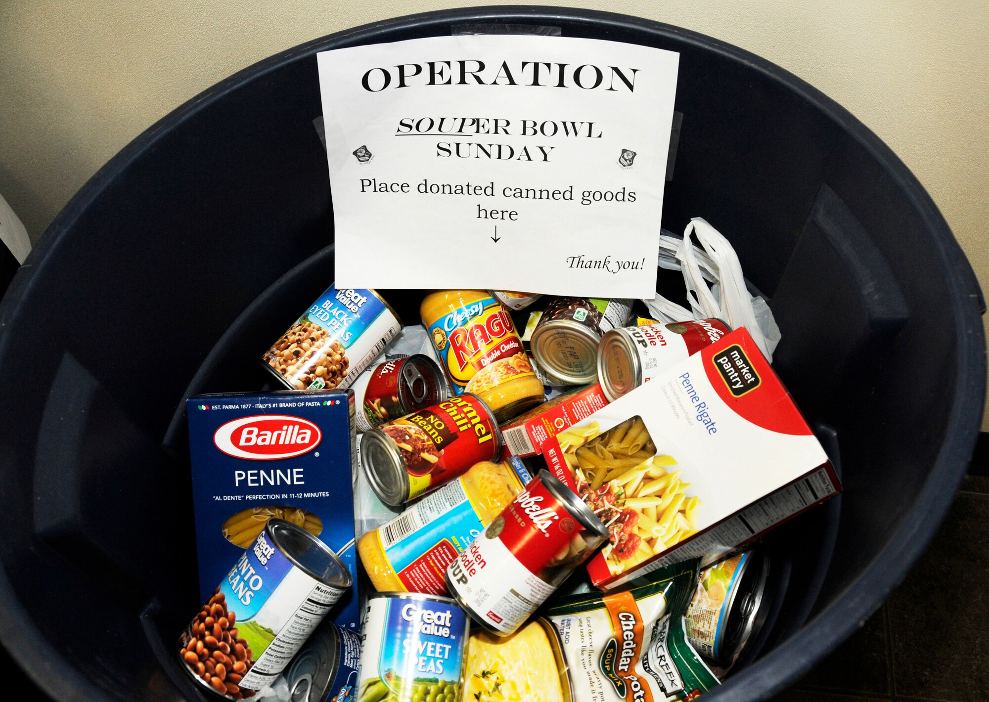 One of several containers filled with non-perishable food items collected by members of the North Carolina Air National Guard, during February’s Unit Training Assembly, held Feb. 6-7, 2016. The NCANG celebrated the Carolina Panthers and Super Bowl Sunday by participating in “Souper” Bowl. “Souper Bowl of Caring” utilizes Super Bowl weekend to rally people together in an effort to help fight hunger and poverty in their local communities. Donations went to Loaves and Fishes food pantry in Charlotte, N.C. (U.S. Air National Guard photo by Master Sgt. Patricia F. Moran/Released)