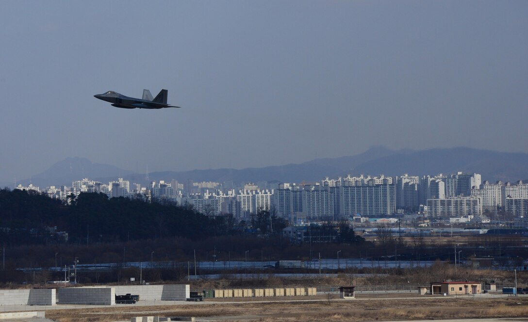 A U.S. Air Force F-22 "Raptor" fighter aircraft from Kadena Air Base, Japan, conducted a flyover in the vicinity of Osan Air Base, South Korea, in response to recent provocative action by North Korea Feb. 17, 2016. Four Raptors were joined by four F-15 Slam Eagles and U.S. Air Force F-16 Fighting Falcons. The F-22 is designed to project air dominance rapidly and at great distances and currently cannot be matched by any known or projected fighter aircraft.  
(U.S. Air Force photo by Staff Sgt. Amber Grimm/Released)