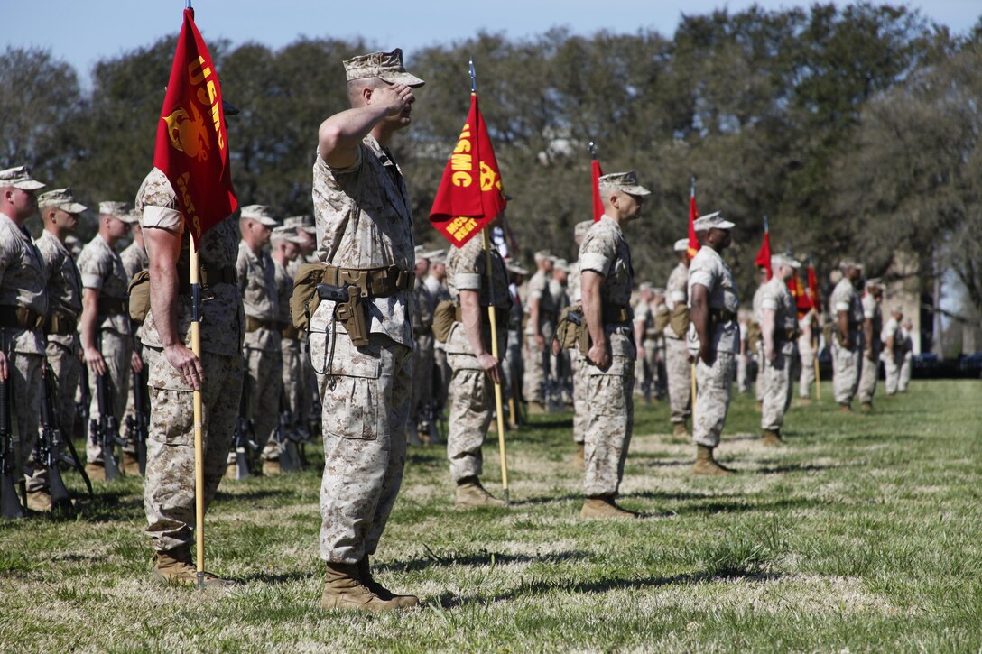U.S. Marines from the Marine Corps Security Force Regiment report in during a post and relief ceremony aboard Naval Station Norfolk, Va., April 2, 2015. Sgt. Maj. William Frye relinquished his duties as the Regimental Sgt. Maj. of the Marine Corps Security Force Regiment to Sgt. Maj. Darby Noonan during a post and relief ceremony. (U.S. Marine Corps photo by Sgt. Esdras Ruano/Released)