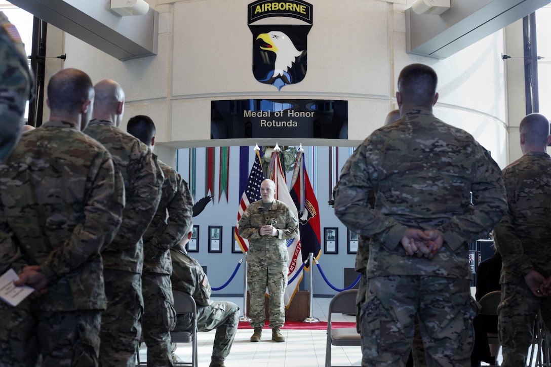 Army Lt. Col. Cory Mulhern, a liaison officer for the 101st Airborne Division, talks about his opportunity not only to serve with the 101st as a Wisconsin National Guardsman, but also to be promoted by the division after his promotion ceremony n the division headquarters, Fort Campbell, Ky., Feb. 11, 2016. Mulhern is part of the 101st’s multicomponent unit, a pilot program in which Guard and active duty soldiers train and deploy together. Army photo by Sgt. 1st Class Nathan Hoskins