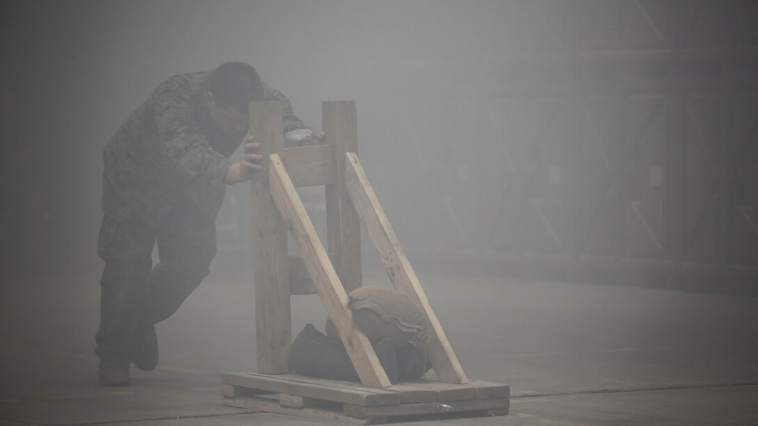 U.S. Navy Seaman Cameron Alexander, a hospitalman with 2nd Medical Battalion, conducts physical exercises before a tactical combat casualty care exercise at Marine Corps Base Camp Lejeune, N.C., Feb. 12, 2016. Sailors were intentionally exhausted prior to beginning the simulation. 