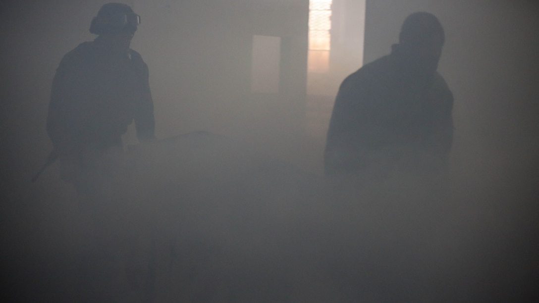 U.S. Navy Sailors with 2nd Medical Battalion, evacuate a casualty during a tactical combat casualty care exercise at Marine Corps Base Camp Lejeune, N.C., Feb. 12, 2016. The extent of the injuries sailors had to treat on their patients included penetrating chest trauma, shrapnel penetration, amputation, airway obstructions and facial trauma. 