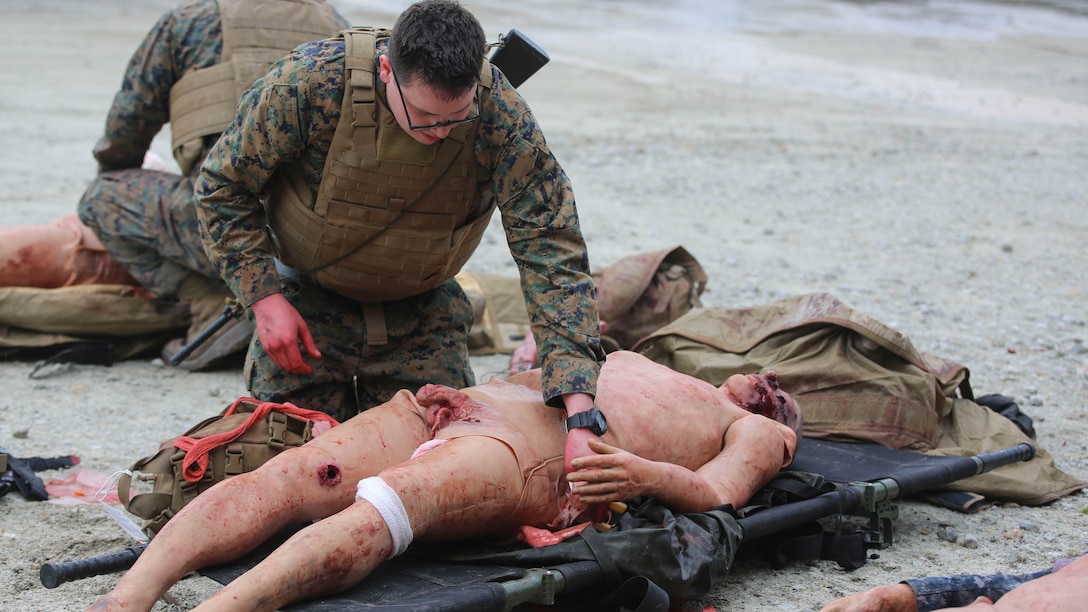 U.S. Navy Petty Officer Second Class Aaron Matthess, a hospital corpsman with 2nd Medical Battalion, treats a casualty during a tactical combat casualty care exercise at Marine Corps Base Camp Lejeune, N.C., Feb. 12, 2016. The extent of the injuries sailors had to treat on their patients included penetrating chest trauma, shrapnel penetration, amputation, airway obstructions and facial trauma. 