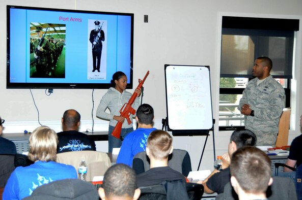 Senior Airman Brandon Pendleton, supervisor of the 910th Development and Training Flight (D&TF), instructs recruits on the M16A2 rifle here Feb. 7, 2016. The 910th D&TF prepares Air Force Reserve recruits for the rigors of basic military training. (U.S. Air Force photo/Tech. Sgt. James Brock)