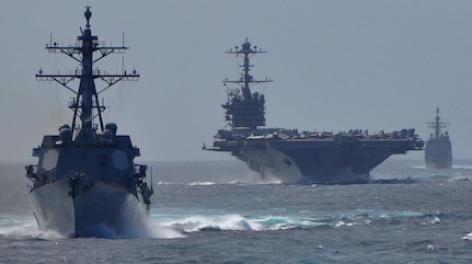 The Arleigh Burke-class guided-missile destroyer USS Mustin (DDG 89) (left), the Nimitz-class aircraft carrier USS George Washington (CVN 73) (center) and the Ticonderoga-class guided-missile cruiser USS Antietam (CG 54) transit in formation. A new virtual cyber ship called USS Secure - not pictured - is also emerging on the horizon. The USS Secure testbed is designed to turn Navy ships such as the Mustin, Washington, and Antietam into cybersafe warships. Cybersecurity experts from the Navy and Joint Staff will examine USS Secure's ability to transition its cyberdefense technologies to the Fleet by replicating a naval combatant in a system of systems environment during a March 2016 test event. 