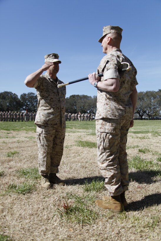 U.S. Marine Sgt. Maj. Darby Noonan receives the duties of regimental Sgt. Maj. of the Marine Corps Security Force Regiment during a post and relief ceremony aboard Naval Station Norfolk, Va., April 2, 2015. Noonan is incoming from the position of Sgt. Maj. of 2nd Marine Special Operations Support Battalion. (U.S. Marine Corps photo by Sgt. Esdras Ruano/Released)