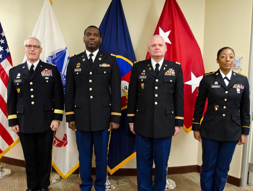 Maj. Gen. Peter S. Lennon, Deputy Commanding General (Support), U.S. Army Reserve, stands alongside the 2015 U.S. Army Reserve Instructor of the Year recipients, Capt. Edgar Borgella, assigned to the 83rd U.S. Army Reserve Readiness Training Center; Chief Warrant Officer 4 David Griffin, also with the 83rd USARRTC; and Sgt. 1st Class JaDrian A. Whitfield, with the 80th Training Command, at USARC headquarters, Feb. 11, 2016. Each instructor, representing the officer, warrant officer, and noncommissioned officer category, were honored in the first USARC hosted Instructor of the Year Ceremony held here. The Training and Doctrine-U.S. Army Reserve Instructor of the Year winner will be announced April 8, 2016. (U.S. Army Reserve photo by Brian Godette, USARC Public Affairs)