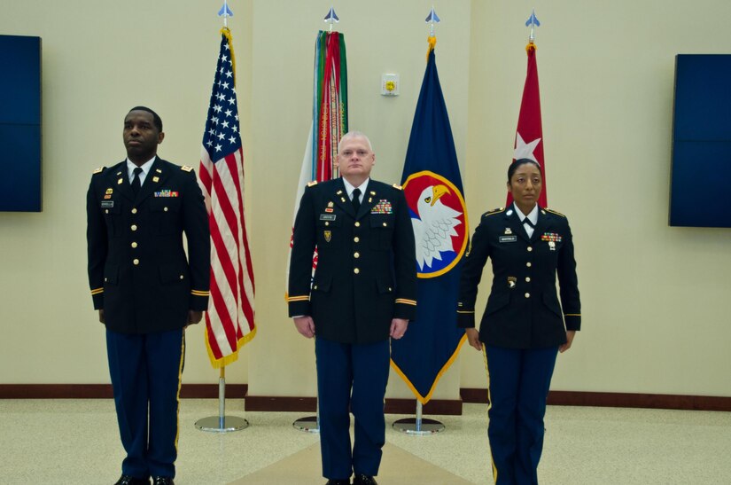 The 2015 U.S. Army Reserve Instructor of the Year recipients, Capt. Edgar Borgella, assigned to the 83rd U.S. Army Reserve Readiness Training Center; Chief Warrant Officer 4 David Griffin, also with the 83rd USARRTC; and Sgt. 1st Class JaDrian A. Whitfield, with the 80th Training Command, stand at attention at the U.S. Army Reserve Command headquarters, February 11, 2016. Each instructor, representing the officer, warrant officer, and noncommissioned officer category, were honored in the first USARC hosted Instructor of the Year Ceremony. The Training and Doctrine-U.S. Army Reserve Instructor of the Year winner will be announced April 8, 2016. (U.S. Army Reserve photo by Brian Godette, USARC Public Affairs)
