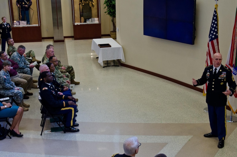 Sgt. Maj. Blaine Huston, G-3/5/7 sergeant major, U.S. Army Reserve Command, provides closing remarks during the first USARC hosted Instructor of the Year Ceremony at USARC headquarters, Feb. 11, 2016. Each instructor, representing the noncommissioned  officer, warrant officer, and officer category, were honored for their selection and highly praised for their continuous efforts by Huston. (U.S. Army Reserve photo by Brian Godette, USARC Public Affairs)