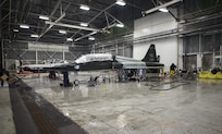 Members of the 12th Flying Training Wing Maintenance Directorate wash a T-38 Talon Feb. 2 at the new wash rack inside Hangar 42 at Joint Base San Antonio-Randolph. The 14-member corrosion control team now has its own indoor wash rack in Hangar 42 with benefits that include washes unimpeded by weather conditions and an environmentally friendly water-recycling system that conserves water, saving the Air Force $174,000 per year.