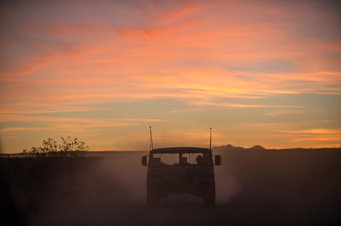 A tactical vehicle maneuvers across the training area at the National Training Center, Fort Irwin, Calif., Feb. 12, 2016. The National Training Center conducts tough, realistic training to prepare brigade combat teams and other units for combat. (U.S. Army photo by Staff Sgt. Alex Manne/Released)