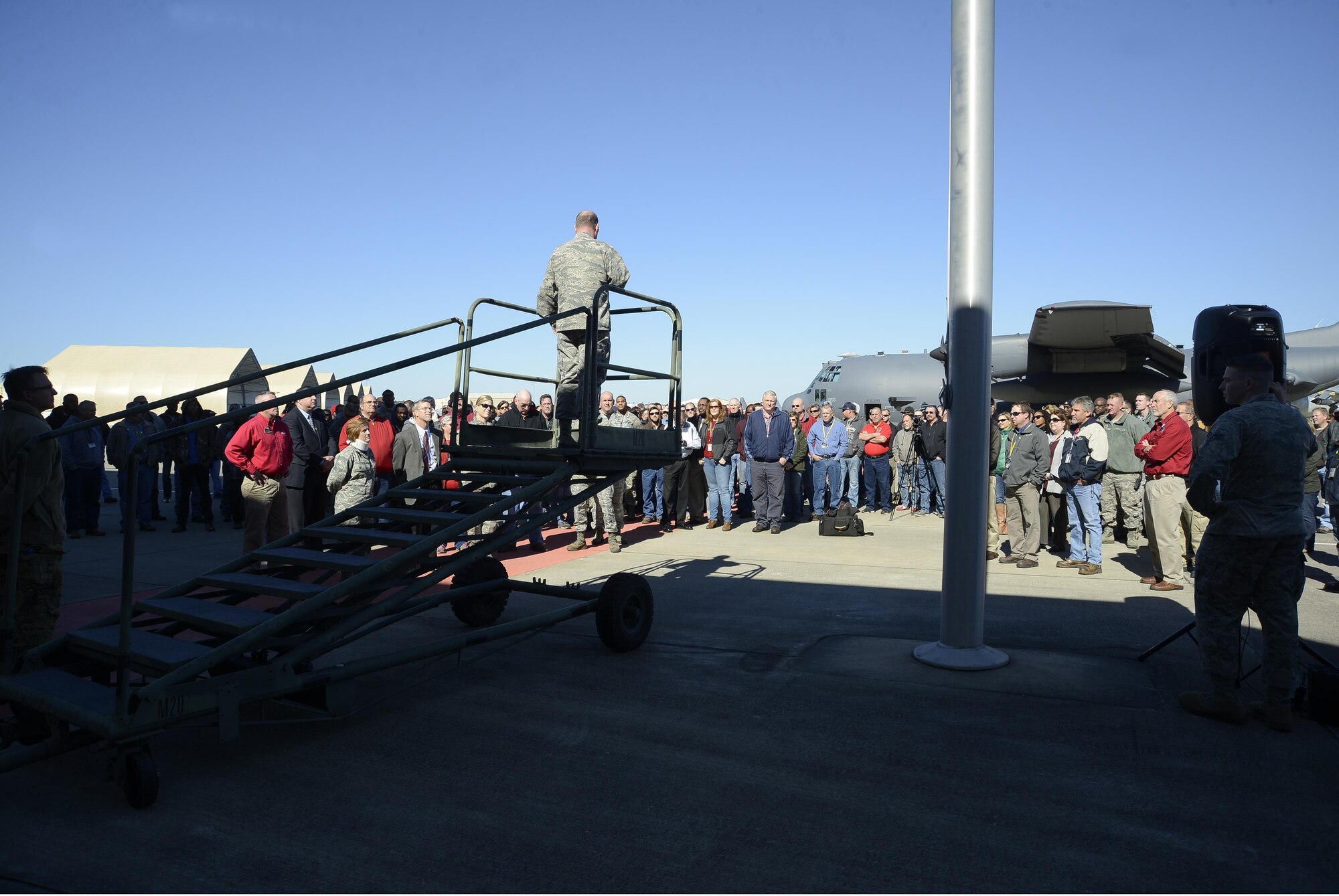 Maj. Gen. Eugene Haase, AFSOC vice commander, addresses the Robins workforce after landing. The crew talked to Robins employees, sharing stories and talking about their responsibilities flying the aircraft. (U.S. Air Force photo by Ed Aspera)