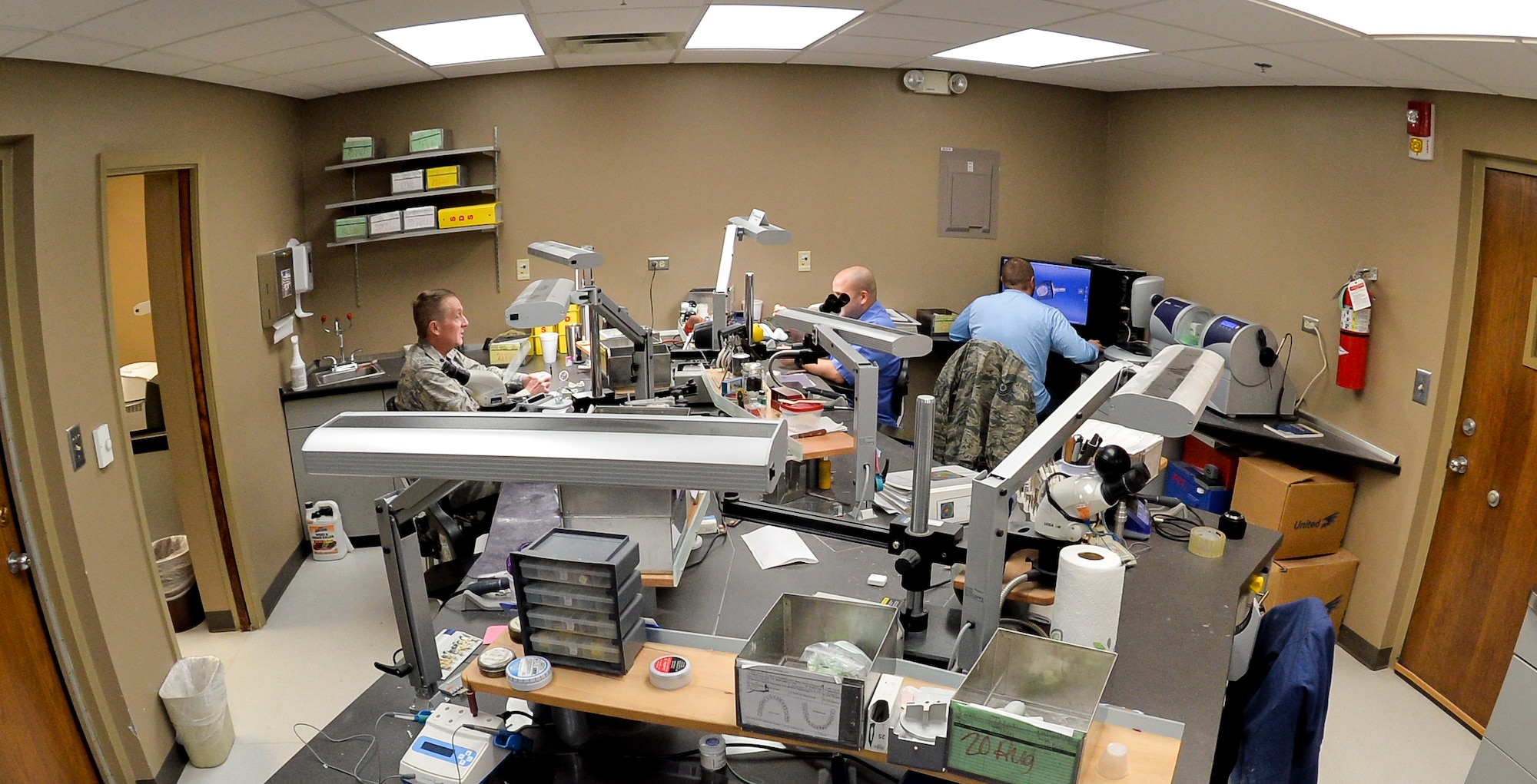 Dental laboratory technicians with the 2nd Dental Squadron process service requests at Barksdale Air Force Base, La., Feb. 12, 2016. The 2nd DS creates a variety of products including nightguards, retainers, crowns, bridges and implants to assist with dental care. (U.S. Air Force photo/Airman 1st Class Mozer O. Da Cunha)