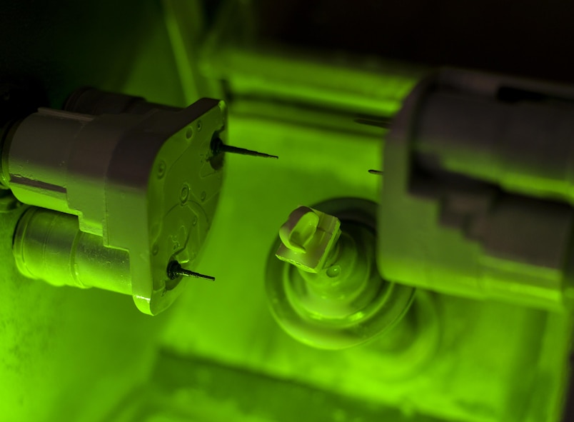 Raw material is milled in to a crown at Barksdale Air Force Base, La., Feb. 12, 2016. By using a series of precise calculations and measurements the milling machine created a crown from the material in 18 minutes. (U.S. Air Force photo/Airman 1st Class Mozer O. Da Cunha) 