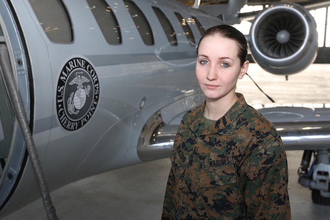 Lance Cpl. Rebecca A. Newton poses in front of a UC-35C/D Citation at Marine Corps Air Station Cherry Point, N.C., Feb. 8, 2016. Newton was awarded Station Marine of the Year for her hard work and dedication. She has served at MCAS Cherry Point for more than a year with Marine Transport Squadron 1 and is an aviation operations specialist. (U.S. Marine Corps photo by Pfc. Nicholas P. Baird/Released)