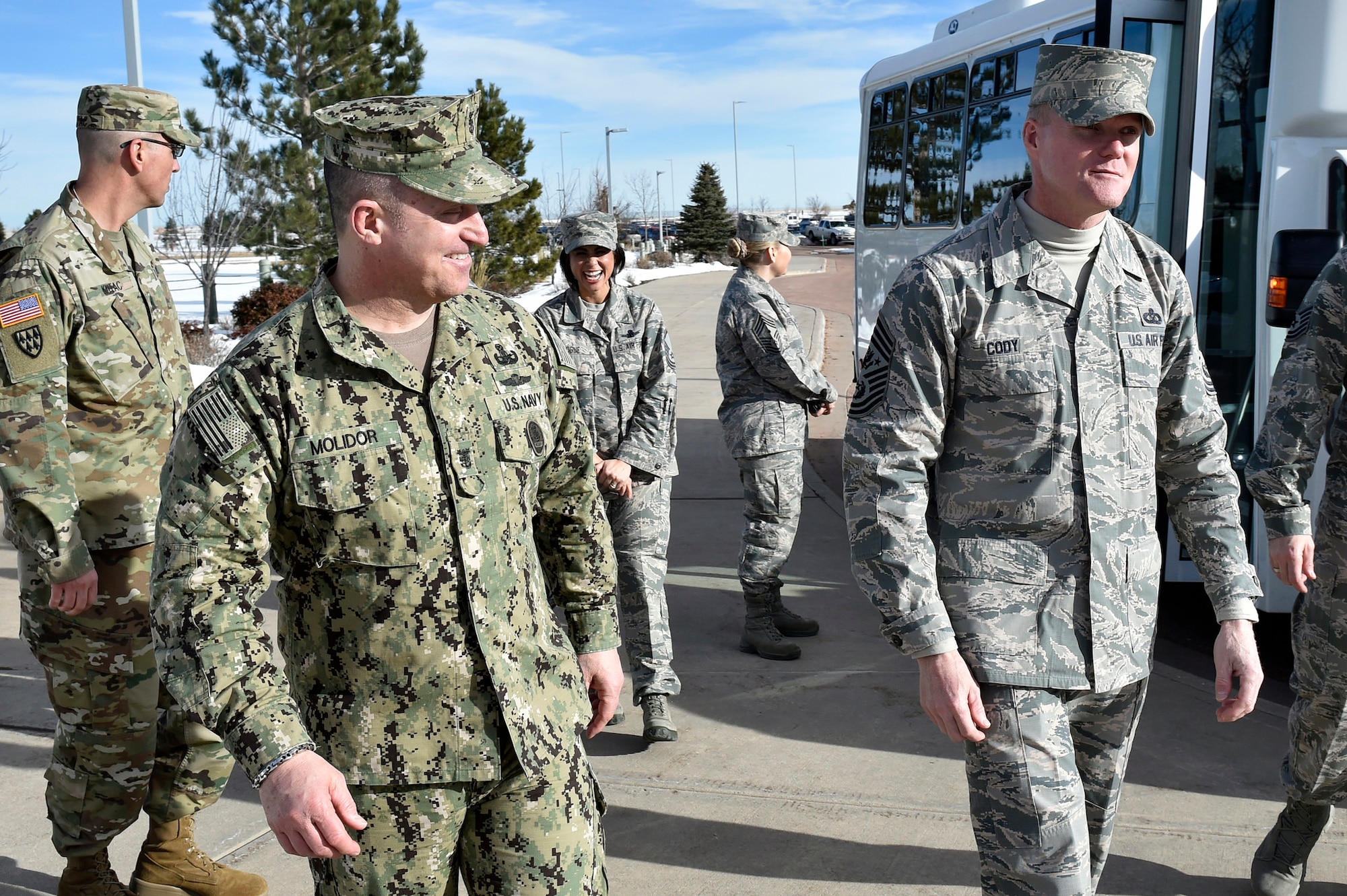 Chief Master Sgt. of the Air Force James A. Cody, right, is greeted by Fleet Master Chief Terrence Molidor, the command senior enlisted advisor for the North American Air Defense Command and U.S. Northern Command, Feb. 11, 2016, at Peterson Air Force Base, Colo. Cody toured the commands’ facility, met with senior enlisted members and recognized several enlisted service members for excellence. (U.S. Air Force Photo/Master Sgt. Andy Bellamy)