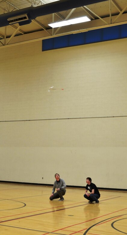 ALBUQUERQUE, N.M. – Two students watch their plane fly in the Wright Stuff event at the 2016 Central New Mexico Science Olympiad, Jan. 30, 2016.