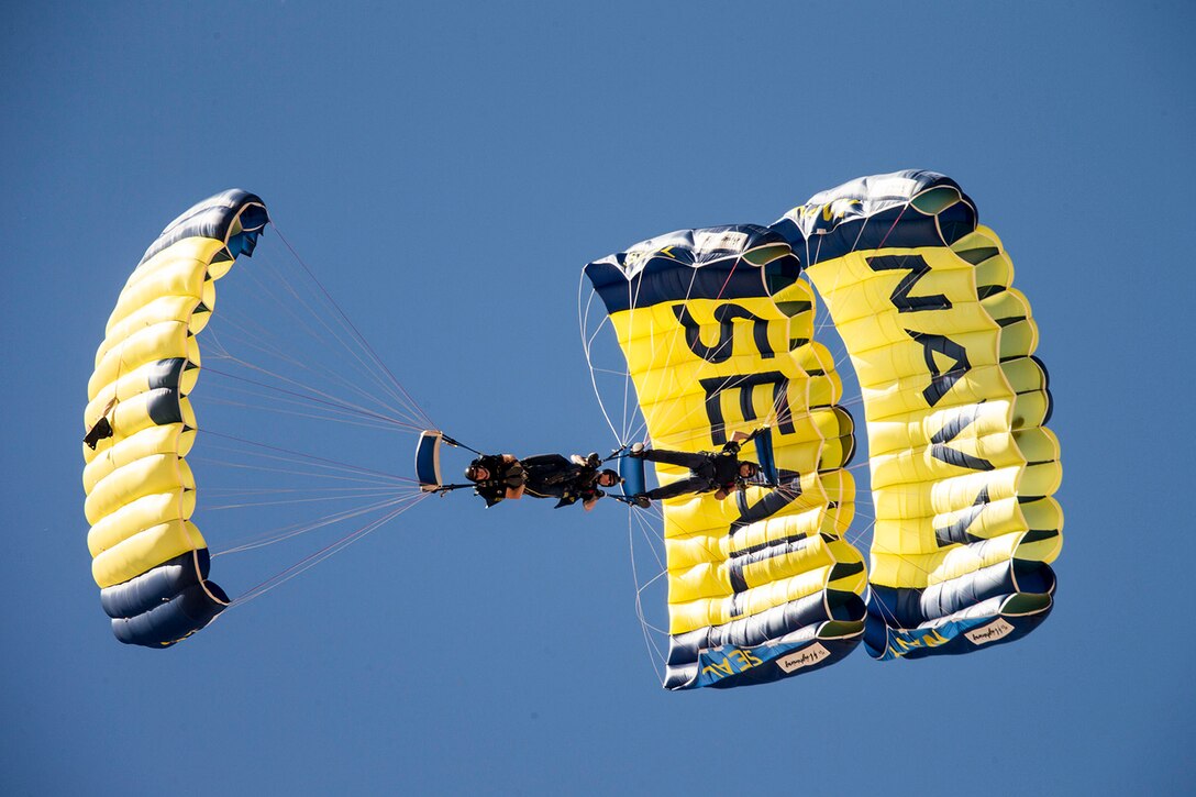 Members of the Leap Frogs, the Navy’s parachute team, perform during a training demonstration in Eloy, Ariz., Feb. 11, 2016. The Leap Frogs are in Arizona preparing for their 2016 show season. Navy photo by Bruce Griffith