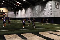 Chicago-area Marines led the Northwestern University women’s lacrosse team in a team-building and physical conditioning exercise at the university’s Nicolette indoor practice facility in Evanston, Ill., Feb. 16, 2016. The Marines taught the players how to react quickly and effectively against rapidly approaching and unforeseeable threats, drawing comparisons from the battlefield and the lacrosse field.