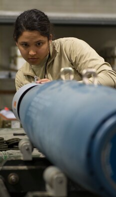 2nd Lt. Amanda Ryder, 366th Equipment Maintenance Squadron crew member, assembles a guided bomb unit-12 Paveway II, Feb. 8, 2016, at Mountain Home Air Force Base, Idaho. The GBU-12s were assembled to be used during an initial operating capability test for the F-35A Lightning IIs. (U.S. Air Force photo by Airman Chester Mientkiewicz/RELEASED)