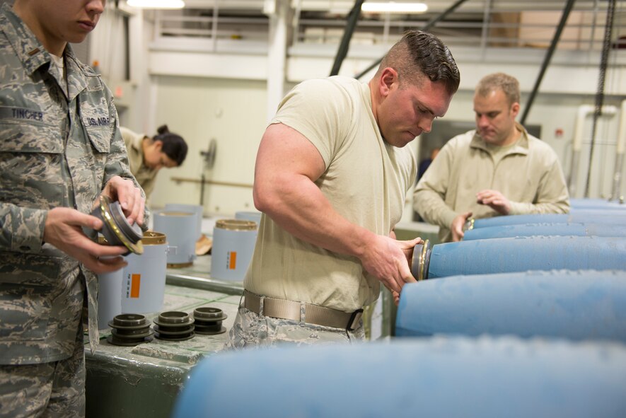 Senior Airman Ben Guthals, 57th Maintenance Squadron munitions systems journeyman, assembles a guided bomb unit-12 Paveway II, Feb. 8, 2016, at Mountain Home Air Force Base, Idaho. Members of the 57th MXS from Nellis AFB, Nev. helped educate Mountain Home AFB airmen on the bomb assembly for the F-35A Lightning II. The bomb assembly marked the first time the GBU-12s were assembled for F-35As on Mountain Home AFB. (U.S. Air Force photo by Airman Chester Mientkiewicz/RELEASED)
