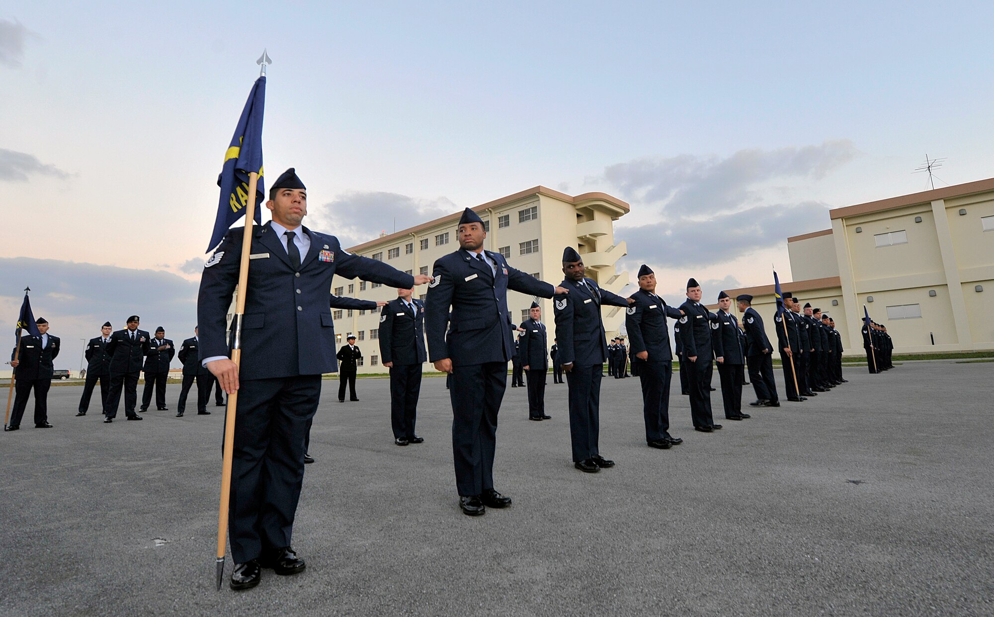 Students from NCO Academy Class 16-2 perform dress right, dress during a service dress uniform inspection, Feb. 9, 2016, at Kadena Air Base, Japan. A total of Seventy-four students attended the six week academy that prepared service members for the increased responsibilities of senior noncommissioned officers. (U.S. Air Force photo by Naoto Anazawa)