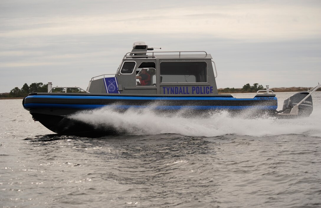 Defenders from the 325th Security Forces Squadron patrol the coastline around Tyndall Jan. 26, in the Valor Class North River Boat. The new boats will advance the 325th SFS provide force protection to 128 miles of shoreline in support of 325th Fighter Wing and 30 associate units. (U.S. Air Force photo by Senior Airman Solomon Cook/Released) 