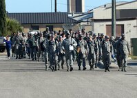 Airmen return to Tyndall Air Force Base, Fla., after a temporary deployment to Nellis Air Force Base, Nev., for the Red Flag 16-1 exercise Feb. 13, 2016. The family members of Airmen lined up around the flightline to greet their loved ones after being separated for almost a month. The mission of Red Flag is to train pilots and other flight crew members from the U.S. and allied countries for real air combat situations. (U.S. Air Force photo by Airman 1st Class Cody R. Miller/Released)